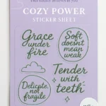 Custom Sticker sheet titled “COZY POWER STICKER SHEET” with five motivational designs in soft green tones. Phrases include “Grace under fire,” “Soft doesn’t mean weak,” “Delicate, not fragile,” “Tender with teeth,” and “Softness is strength.” Stickers shaped like teacups, speech bubbles, and clouds. One cloud sticker is blank for creative use. Printed on clear vinyl with smooth cut edges. Designed by PuffSticker.com to empower gentle souls with bold messages for planners, laptops, and branding kits.