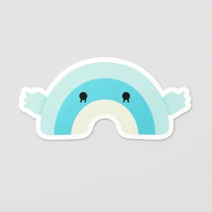 A 3D label designed as a fluffy rainbow-shaped stuffed toy with a soft, puffy texture, built with a sticky backing, foam-filled vinyl base, and resin-coated top for durability. This waterproof sticker is great for creative projects or giveaways, customizable with designs, and available from PuffSticker.com.