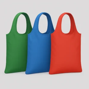 A set of three custom nylon bags in green, blue, and red, crafted from durable, water-repellent polyamide fibers. These lightweight, abrasion-resistant bags are ideal for travel, school, retail, or promotional giveaways, with customizable logos and designs. Offered by PuffSticker.com with fast delivery and quality assurance.
