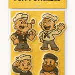 Packaged sheet of puffy stickers titled “PUFFY STICKERS” featuring four cartoon sailor characters in nautical attire. Includes a pipe-smoking sailor, a waving sailor, a saluting sailor, and a bearded sailor with crossed arms and an anchor tattoo. Set against a yellow wave-patterned background with bold black text. Ideal for ocean-themed crafts, kids’ stationery, and whimsical sticker collections.